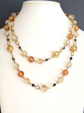 Single strand gold, cognac, clear necklace with gray & gold crystal accent beads